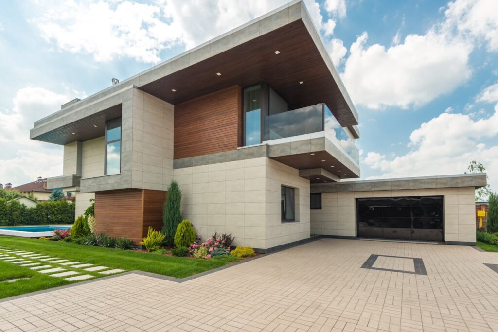 brown-and-white-wooden-house-under-blue-sky-8134847